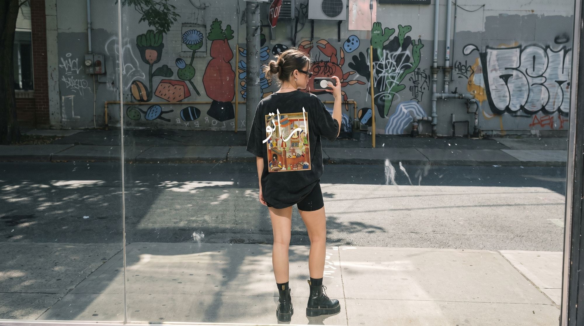 ERATO editorial, street style against a mural wall